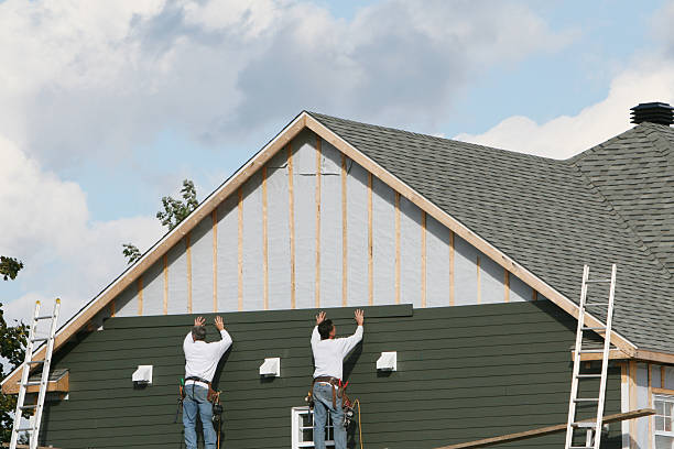 Professional Siding Contractor technician working in Marion, IN